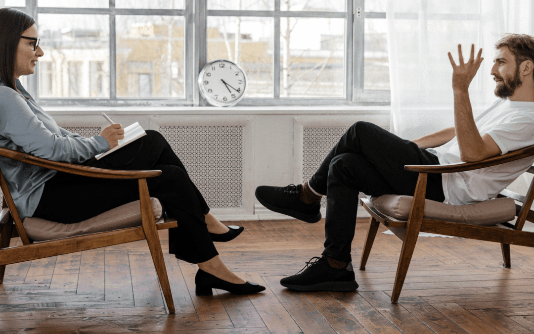 a therapist and person engaging in Therapy for Burnout