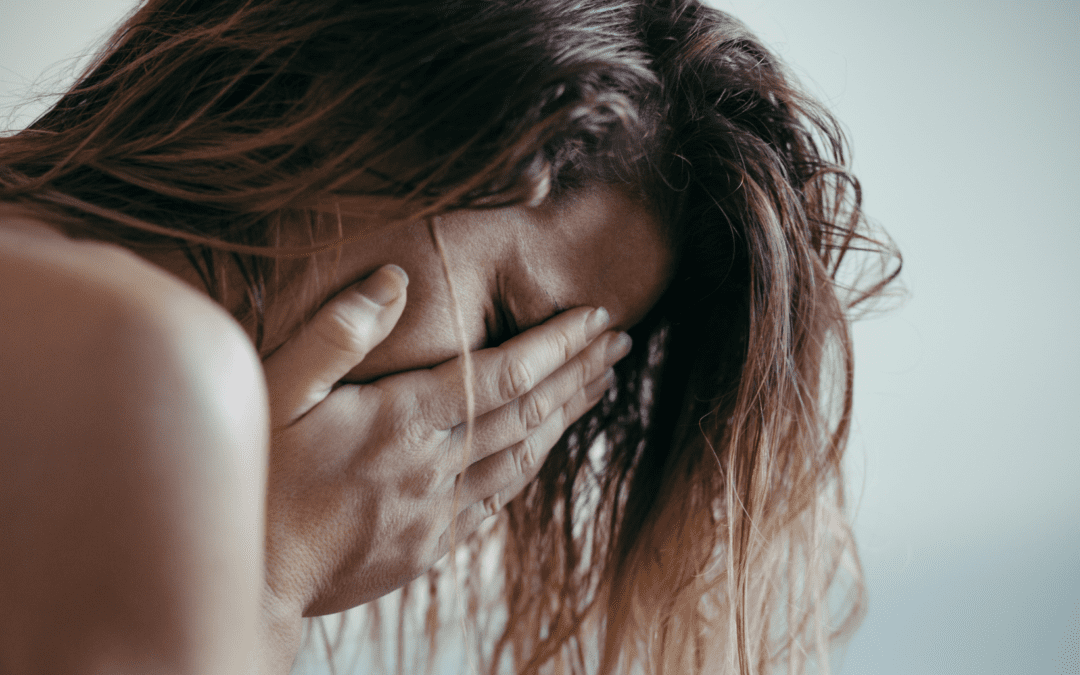 a person crying due to emotional abandonment symptoms